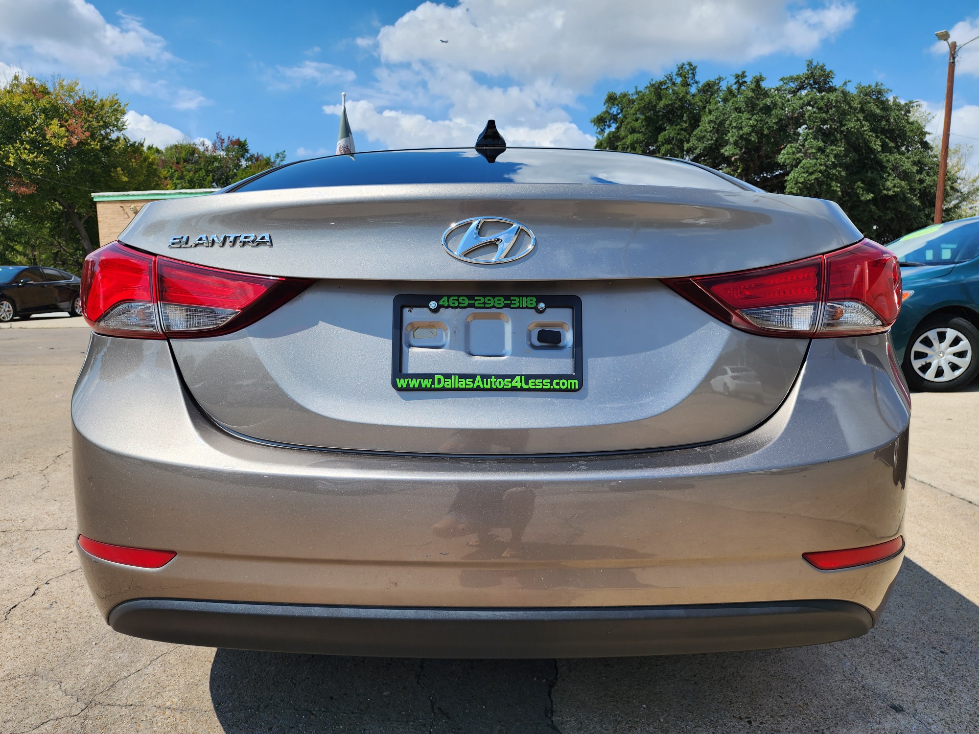 2016 BROWN Hyundai Elantra SE (5NPDH4AEXGH) with an 1.8L L4 DOHC 16V engine, 6-Speed Automatic transmission, located at 2660 S.Garland Avenue, Garland, TX, 75041, (469) 298-3118, 32.885387, -96.656776 - Welcome to DallasAutos4Less, one of the Premier BUY HERE PAY HERE Dealers in the North Dallas Area. We specialize in financing to people with NO CREDIT or BAD CREDIT. We need proof of income, proof of residence, and a ID. Come buy your new car from us today!! This is a Very clean 2016 HYUNDAI ELA - Photo #4